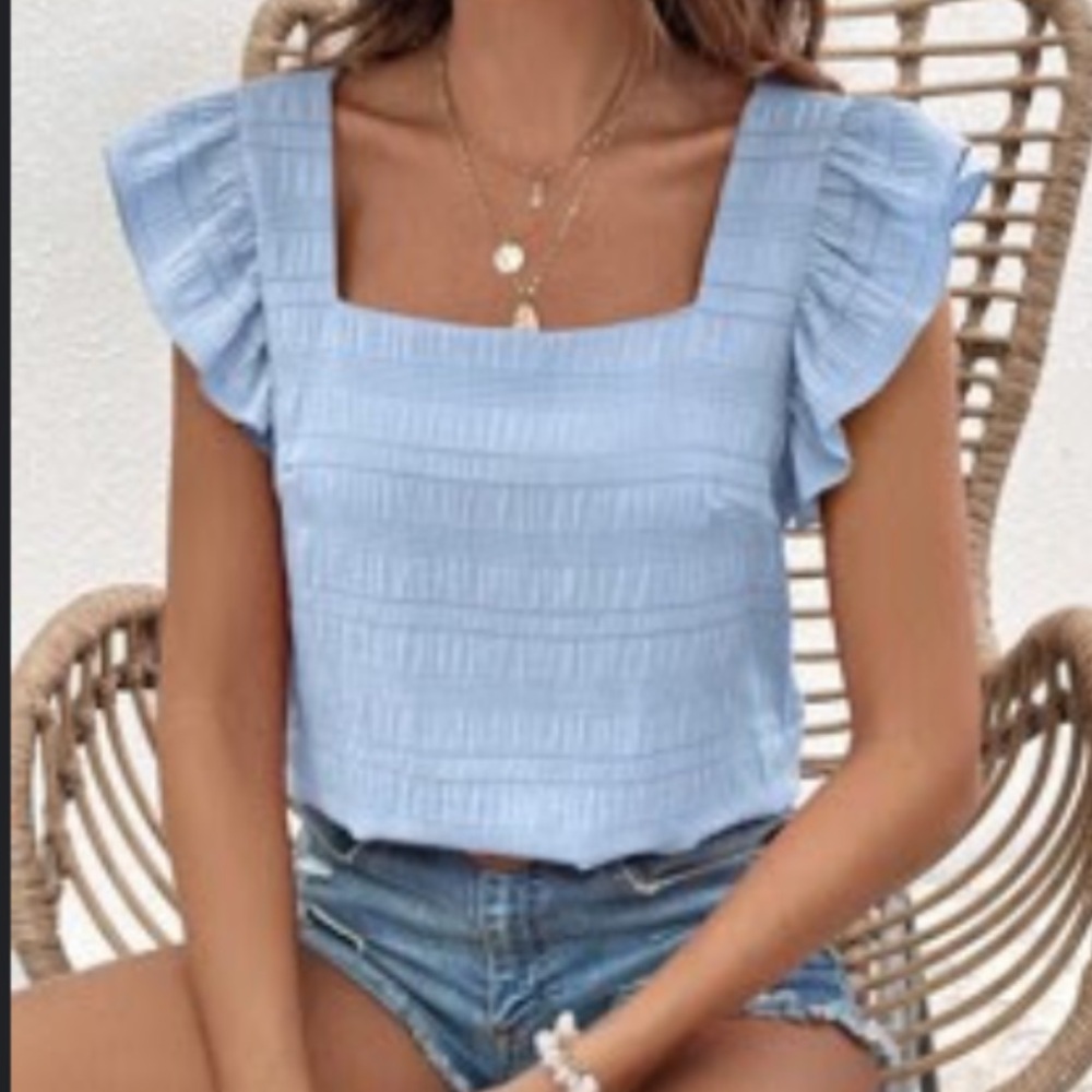Light blue top